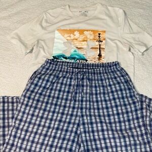 Under Armour shirt and a pair of pajama pants